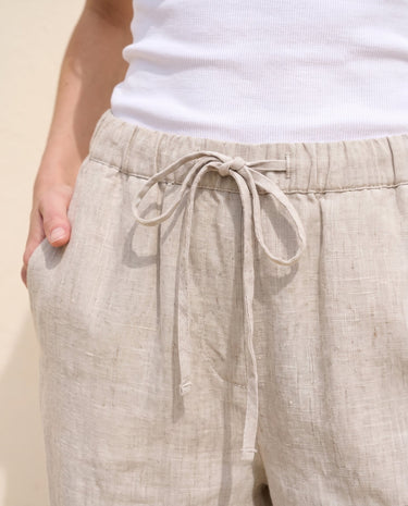 The Loelia Linen Pants in natural linen — close-up of the drawstring waist