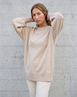 The Lorna knit pullover in beige — back view on model