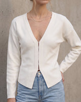 The Maisonette Cardigan in white — front view on model