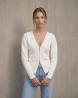 The Maisonette Cardigan in white — front view on model