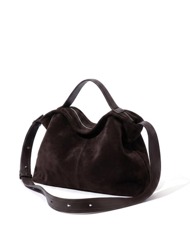 The Manon Suede Tote in coffee, three-quarter studio view on a pure white background