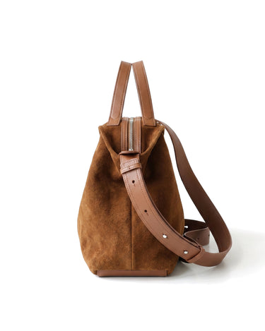 The Manon Suede Tote in tan, side profile view showing the slim 12cm depth