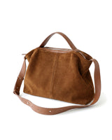 The Manon Suede Tote in tan, rear view showing the smooth leather base panel