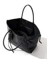 The Marais Carryall in black, open top view showing the roomy interior and zip pocket