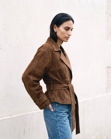 Side view of the dark brown Margot Tie-waist Coat showing the tie belt and hip-length hem