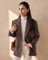 The Maribel blazer in brown — front three-quarter view on model