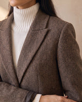 The Maribel blazer in brown — close-up of the notch lapel and shoulder