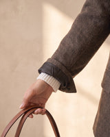 The Maribel blazer in brown — close-up of the turned-back cuff