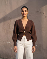 The Marley Cardigan in brown — front view on model