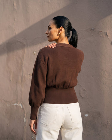 The Marley Cardigan in brown — back view on model