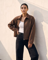 The Maude jacket in brown — front view on model