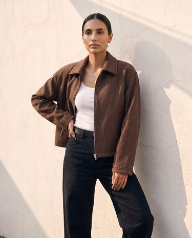 The Maude jacket in brown — front view on model