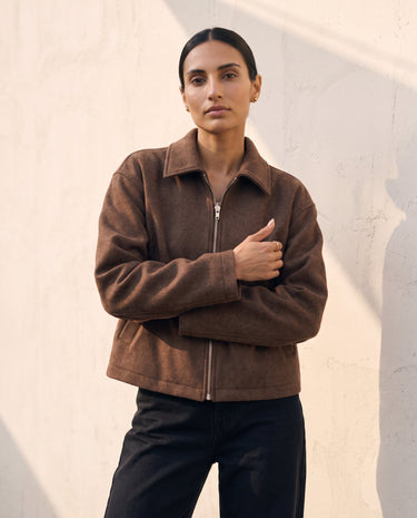 The Maude jacket in brown — front view on model