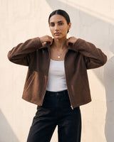The Maude jacket in brown — front view on model