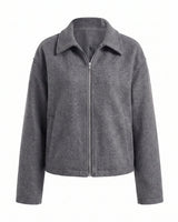 The Maude jacket in gray — zip-front collared jacket with a structured silhouette, product flat-lay