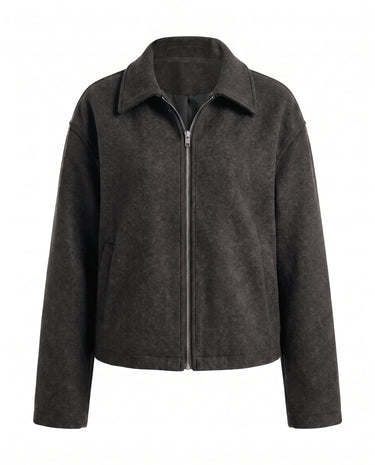 The Maude jacket in black — zip-front collared jacket with a structured silhouette, product flat-lay