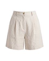 The Mauria Linen Shorts in oat — high-waisted pleated linen shorts, product flat-lay