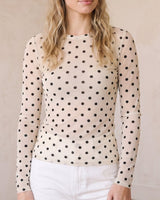 The Milly Polka Dot Sheer Top in cream — sheer polka dot mesh top, front view on model
