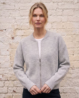 The Molly ribbed zip-up cardigan in gray — front view on model