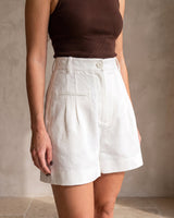 The Monroe short in white — front view on model