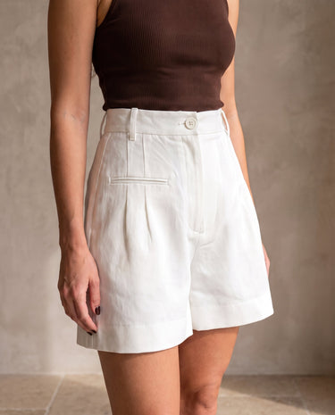 The Monroe short in white — front view on model