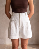 The Monroe short in white — front view on model