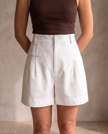 The Monroe short in white — front view on model