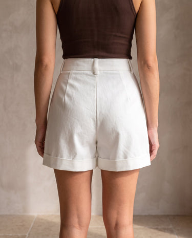 The Monroe short in white — front view on model