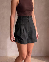 The Monroe short in black — front view on model