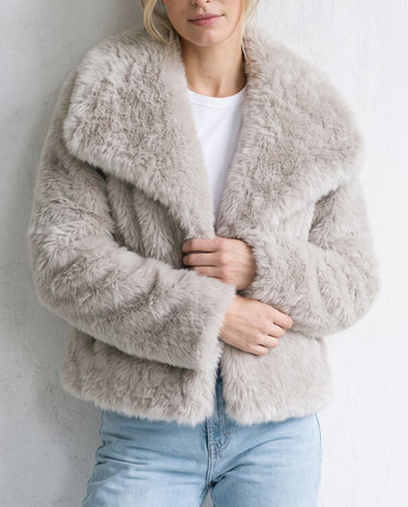 The Noa Faux Fur Coat in beige — faux fur coat, front view on model