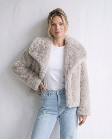 The Noa Faux Fur Coat in beige — faux fur coat, front view on model