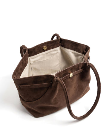 The Odette Suede Tote in brown, open top view showing the cream herringbone lining, interior slip pocket and gold-tone magnetic snap