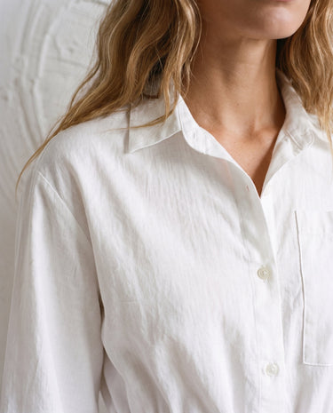 The Palma Cotton Button Up in white — close-up of collar and button placket