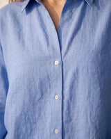 Close-up of the blue shirt's collar and buttoned placket – Moriel Heritage
