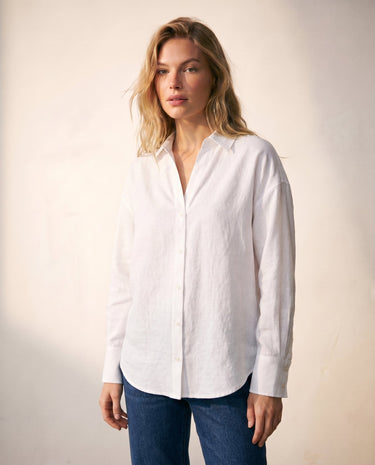 Model wearing the white poplin shirt with dark jeans, front view – Moriel Heritage