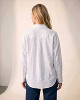 Back view of the white poplin shirt showing the curved hem – Moriel Heritage