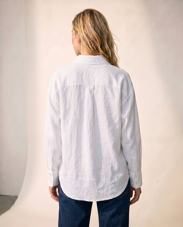 Back view of the white poplin shirt showing the curved hem – Moriel Heritage