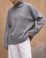 The Ruby sweater in stone — front view on model