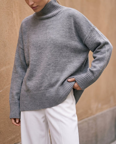 The Ruby sweater in stone — front view on model