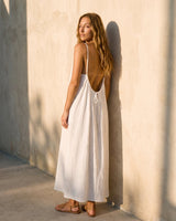 The Rylie Dress in white — low open-back maxi dress, back view on model