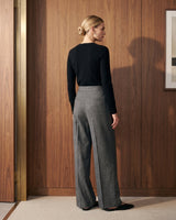 The Sabine tailored trousers in gray — back view on model