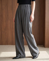 The Sabine tailored trousers in gray — front view showing the full leg on model