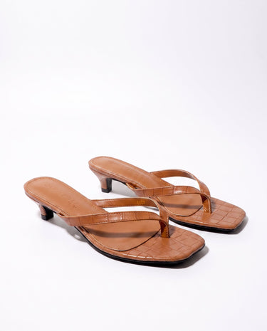 The Saskia thong sandal in brown, kitten-heel style — slim-strap thong sandal, product photo