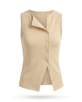 Beige sleeveless ribbed top with an asymmetric button front and split hem, flat lay on white – Moriel Heritage