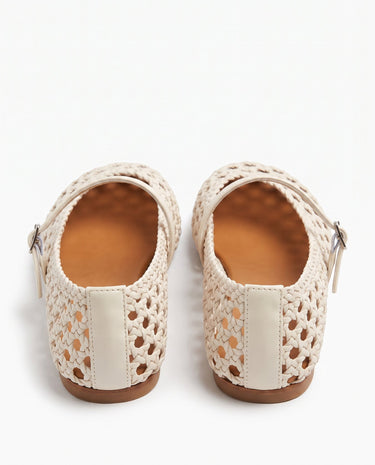 The Wren Mary Janes in white — woven square-toe flats with buckle strap, back heel view