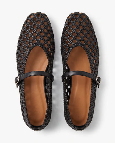 The Wren Mary Janes in black — woven square-toe flats with buckle strap, top-down pair view