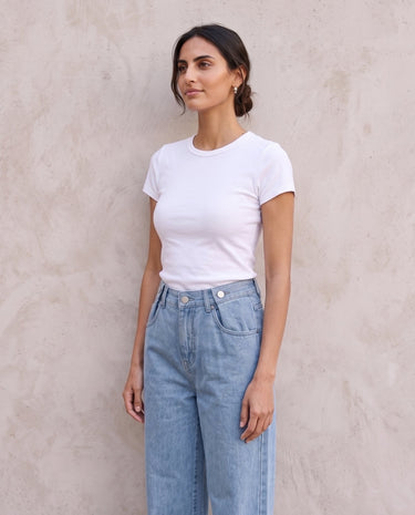 The Tiela Adjustable Jeans in blue — wide-leg jeans, front view on model