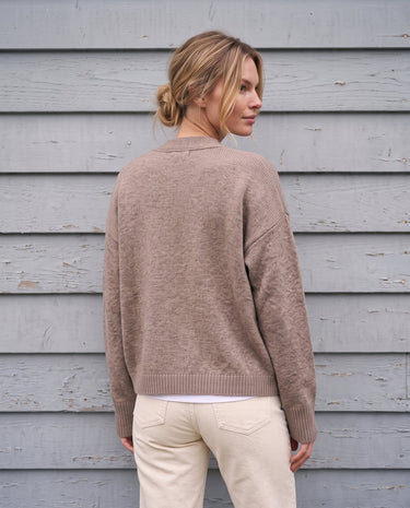 The Vintage Rosabele Cardigan in brown — knit cardigan, back view on model