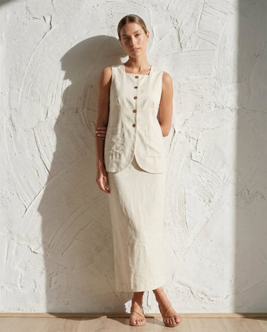 Cream vest and maxi skirt set on model, relaxed front view – Moriel Heritage