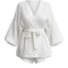 White Seaside Amalfi Set — wrap-front tie-waist top with blouson sleeves and matching shorts, flat-lay